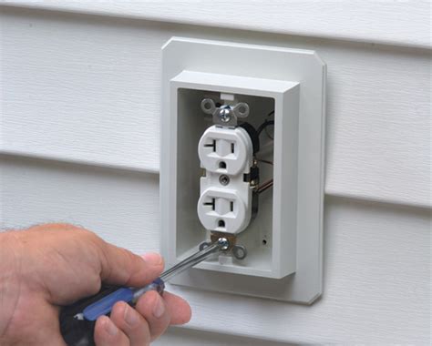 mounting electrical boxes before or after metal siding panels|electrical box holes before siding.